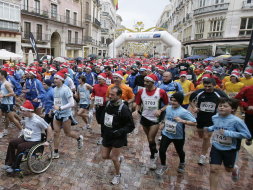 More than 2,000 people take part in VII San Silvestre race in Malaga despite wet weather