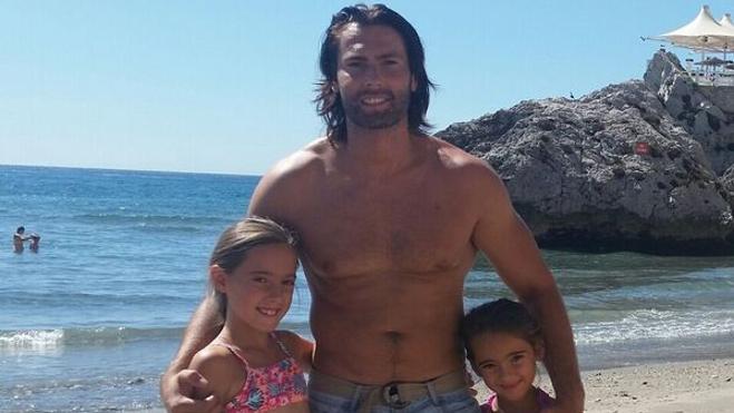 Luisandro, enjoying life with his daughters again. 