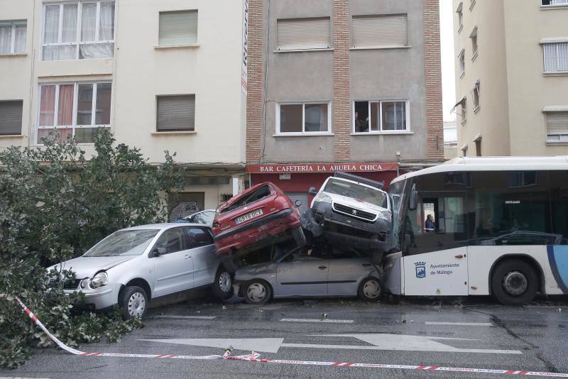 Out-of-control bus ploughs into parked cars as driver suffers heart attack