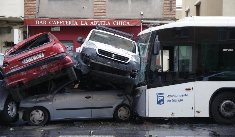 Out-of-control bus ploughs into parked cars as driver suffers heart attack