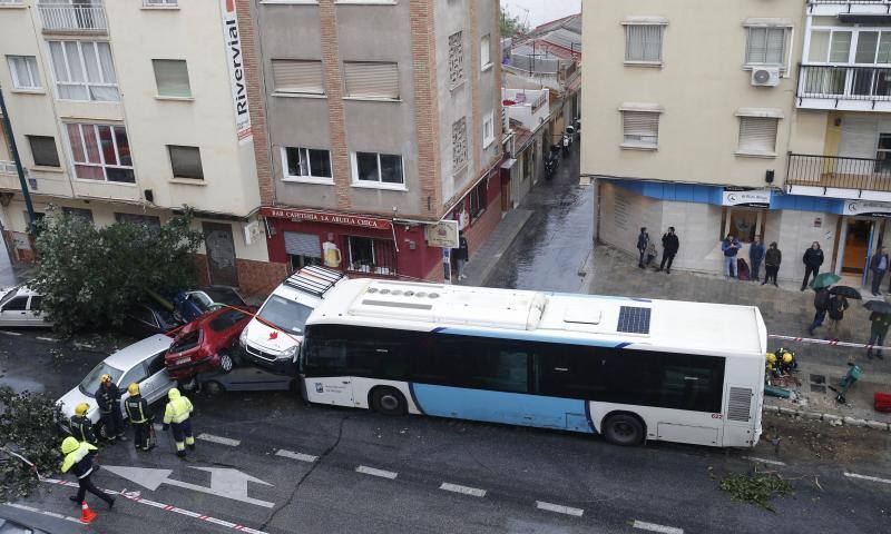 Out-of-control bus ploughs into parked cars as driver suffers heart attack
