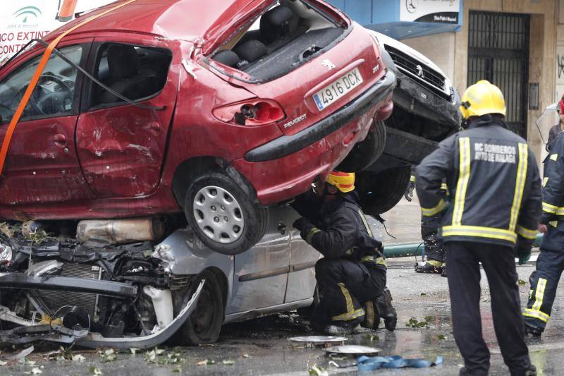 Out-of-control bus ploughs into parked cars as driver suffers heart attack