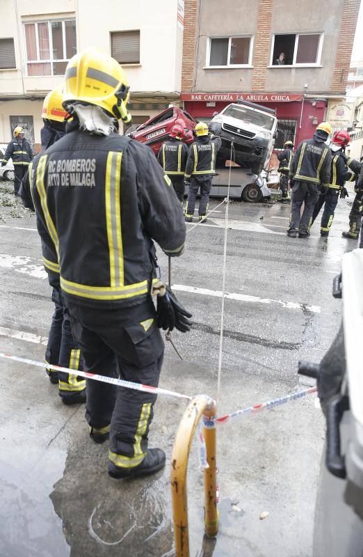 Out-of-control bus ploughs into parked cars as driver suffers heart attack