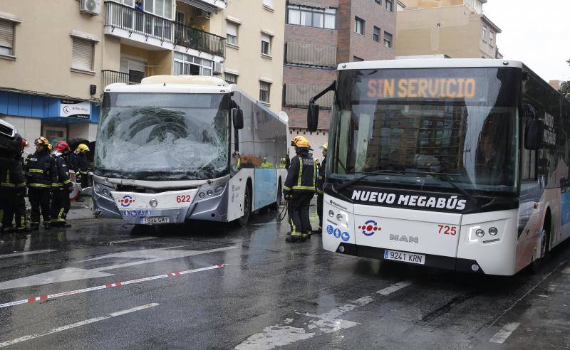 Out-of-control bus ploughs into parked cars as driver suffers heart attack