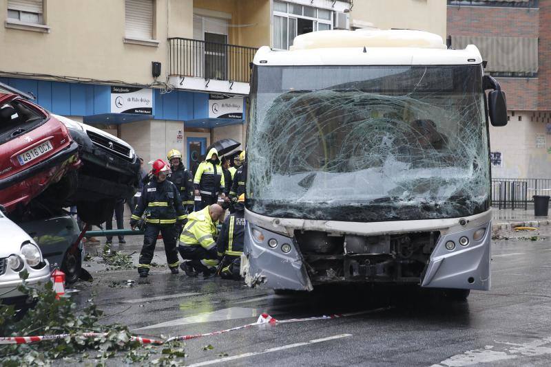 Out-of-control bus ploughs into parked cars as driver suffers heart attack
