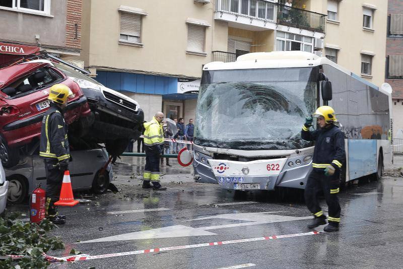 Out-of-control bus ploughs into parked cars as driver suffers heart attack