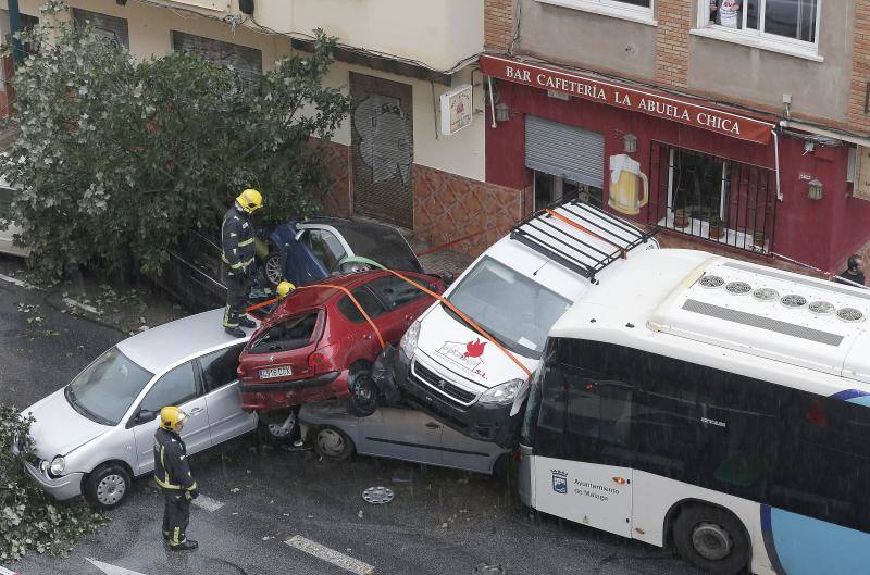 Out-of-control bus ploughs into parked cars as driver suffers heart attack