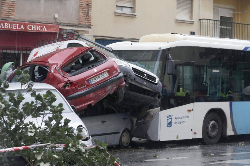 Out-of-control bus ploughs into parked cars as driver suffers heart attack